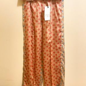 Blue, Beige, and red straight leg pants.